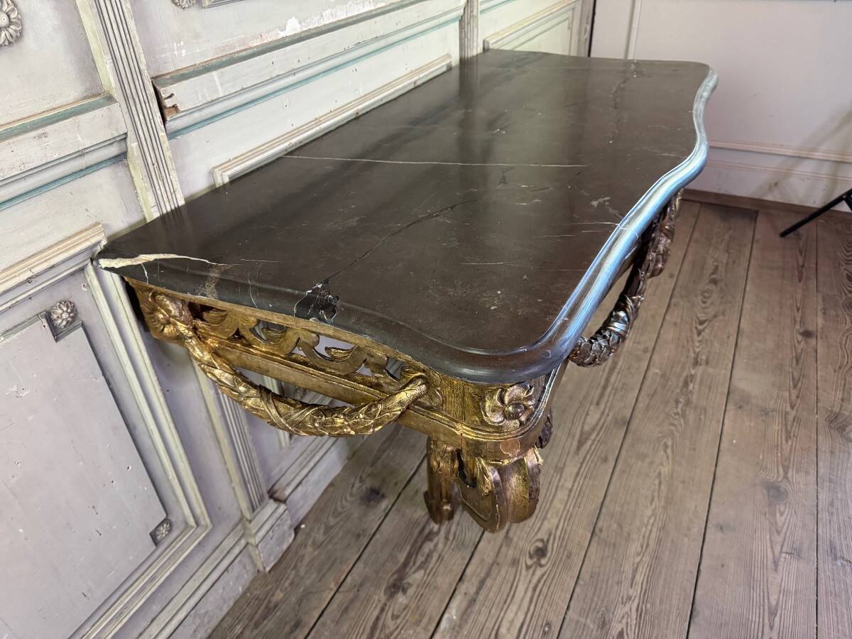 Transitional console in carved and gilded wood, France, 18th century