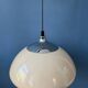 Beige acrylic glass mushroom pendant with a chrome top cap.