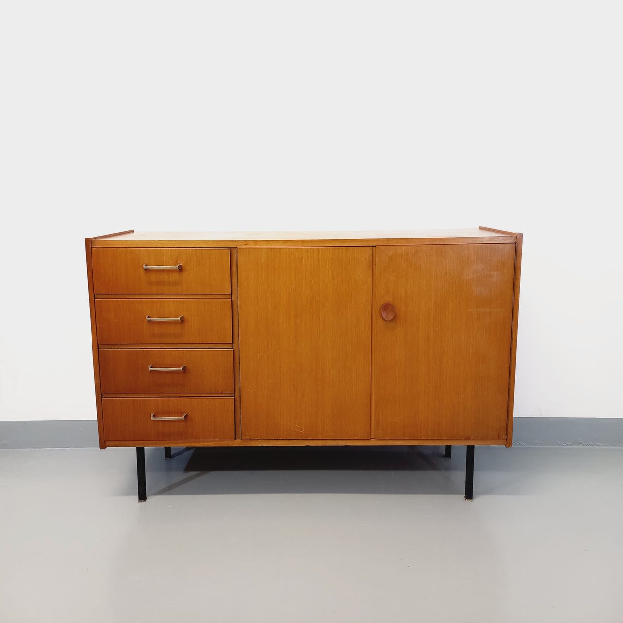 Vintage teak and black metal row from the 60s