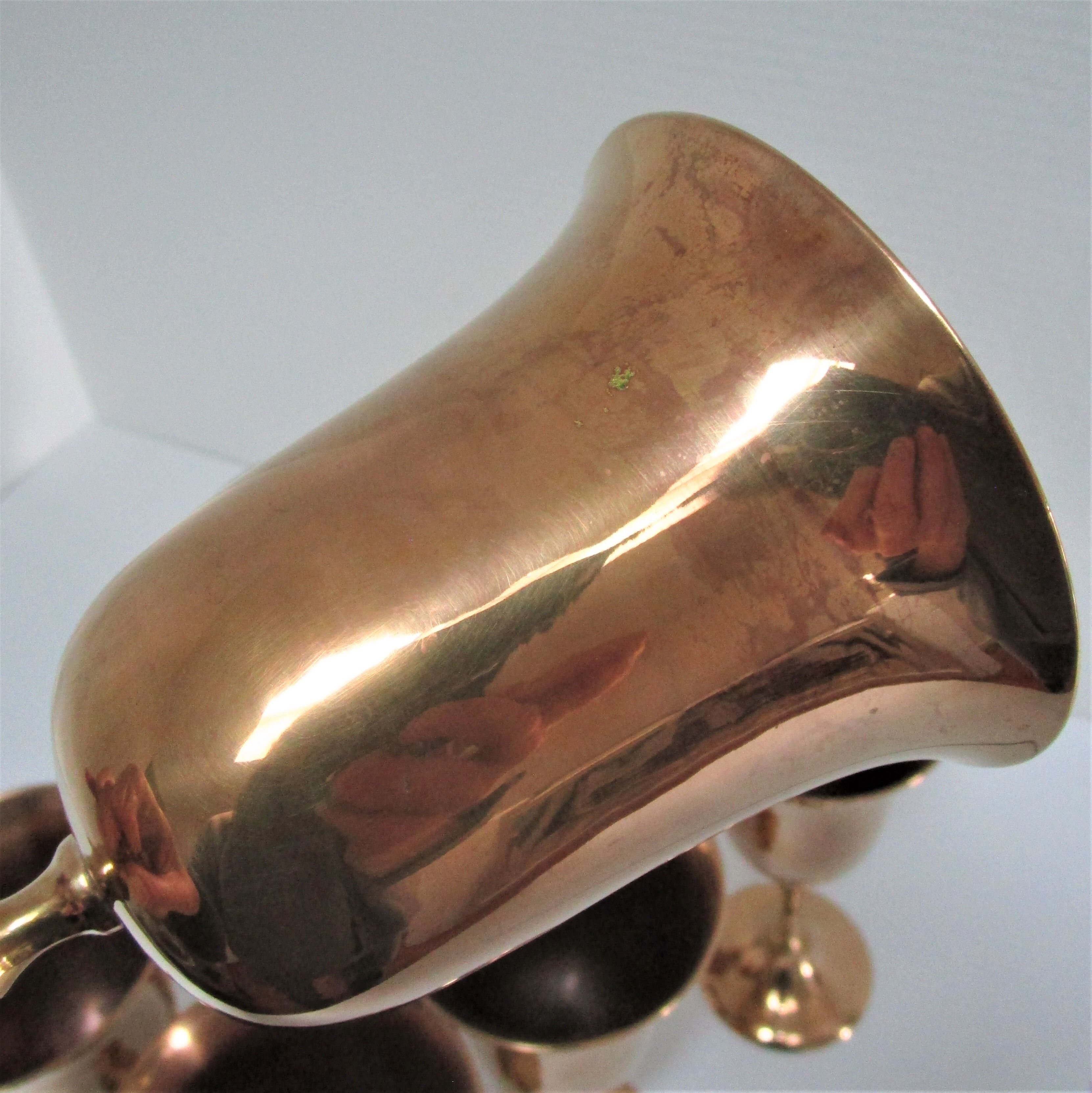 Set of eight vintage solid brass walking glasses