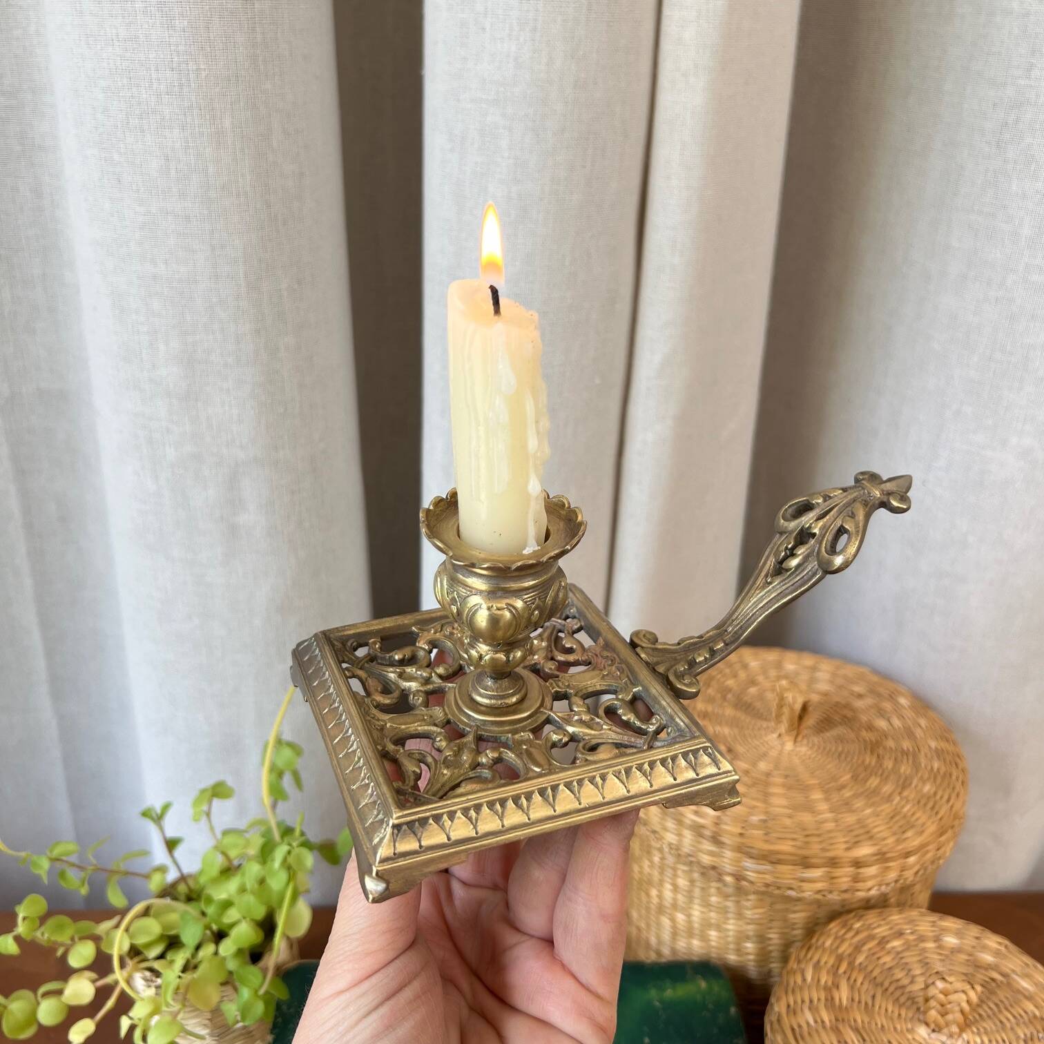 Bronze cellar rat candle holder