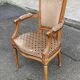 Solid wood and velvet armchair in Louis XVI style