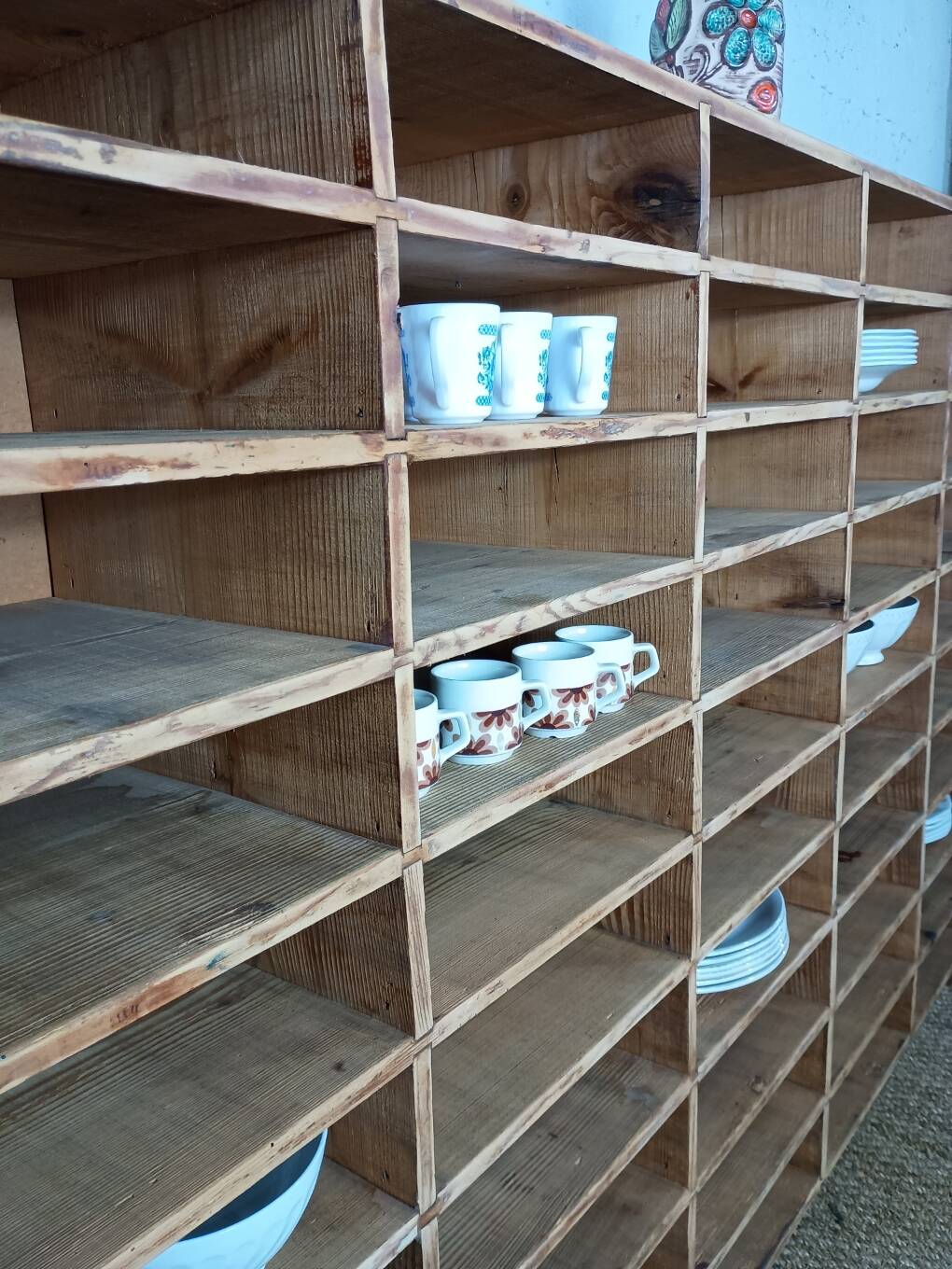 Wooden sorting cabinet with 50 compartments.