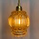 Vintage amber glass globe hand lamp