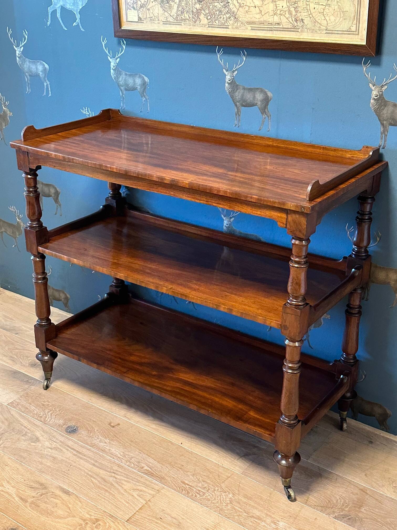 antique mahogany three-tiered étagère