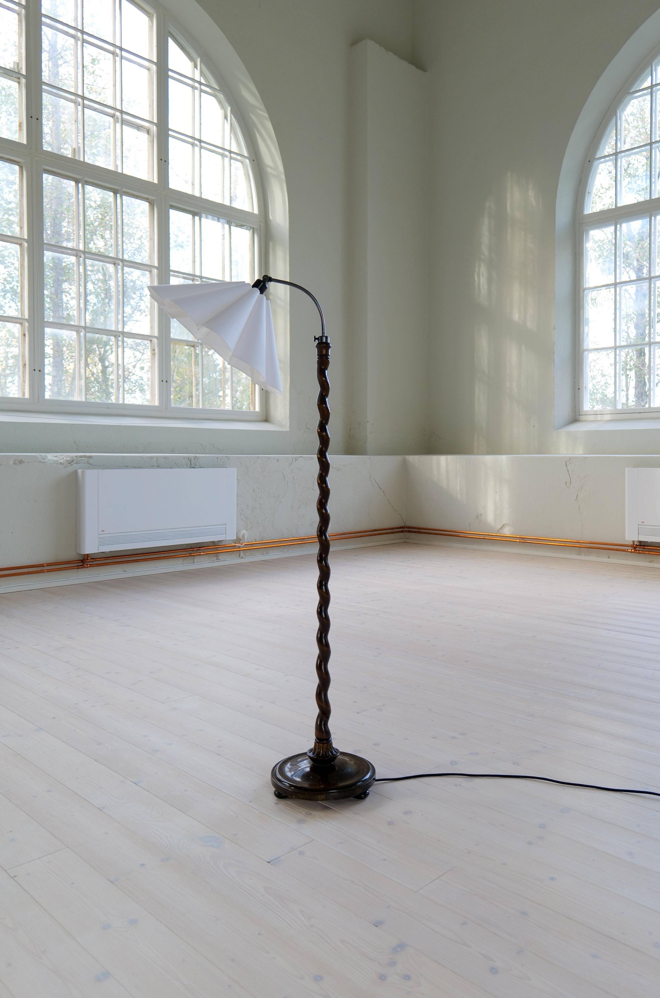 Organic whirlwind floor lamp in stained birch, Sweden, 1940s.