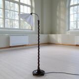 Organic whirlwind floor lamp in stained birch, Sweden, 1940s.