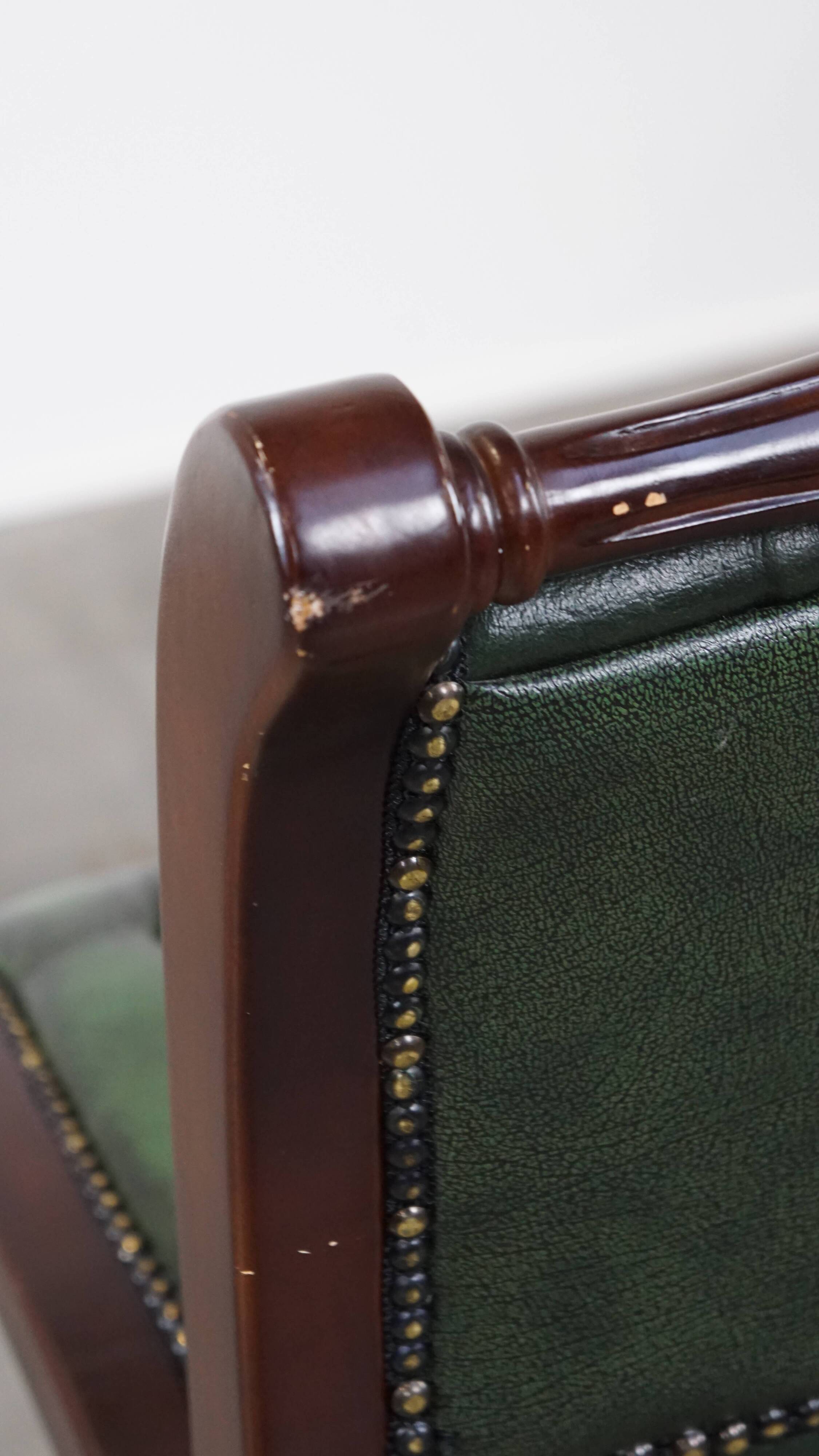 English Chesterfield office chair in green leather, height adjustable on casters