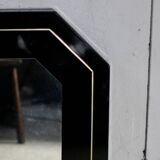 Miroir années 70, bois laqué noir, liseret  laiton. Octogonal