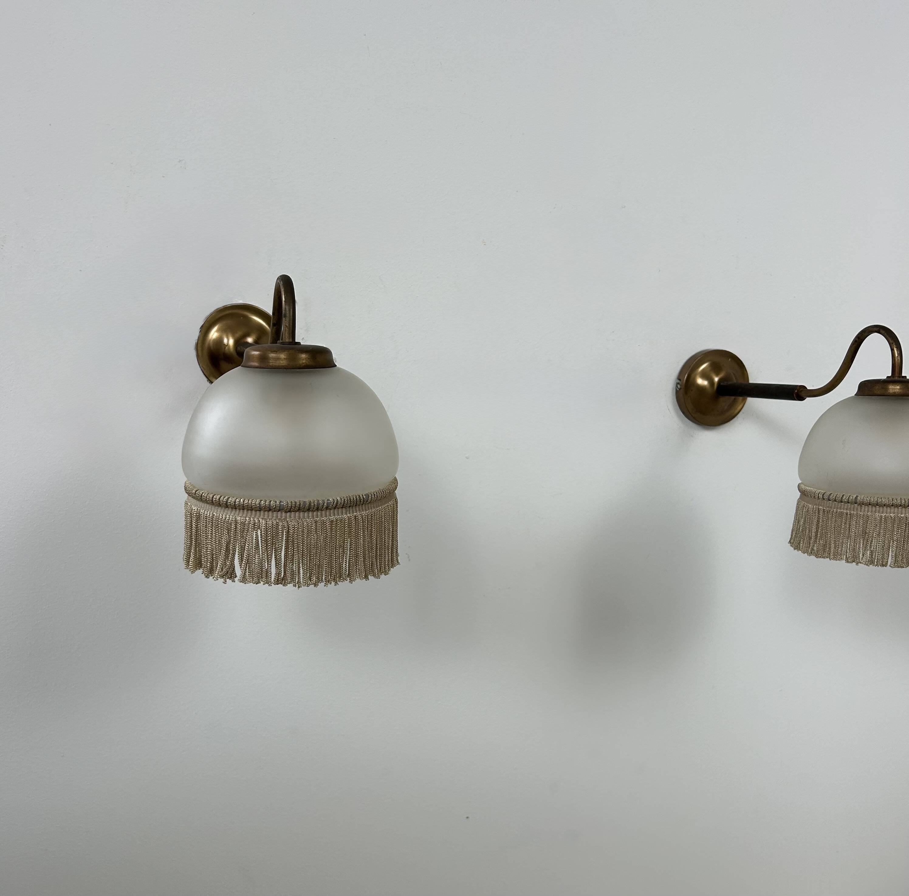 Vintage pair of wall lights, brass and frosted glass, France, 1970.
