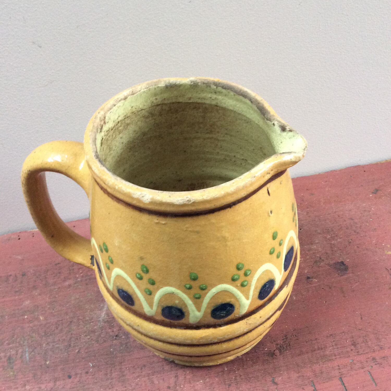 Glazed pottery pitcher