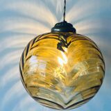 Amber glass ball suspension