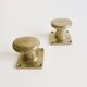 Pair of golden cast iron hooks