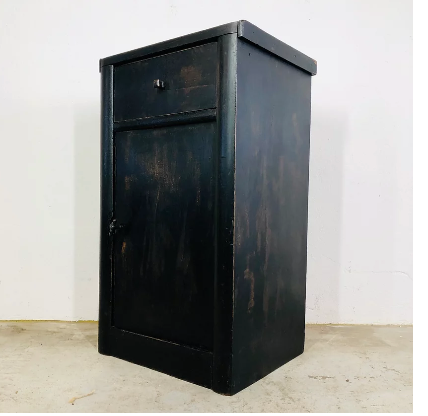 Antique black patinated bedside table
