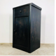 Antique black patinated bedside table
