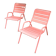 Set of 2 low armchairs Fermob model Monceau in capucine colour.
