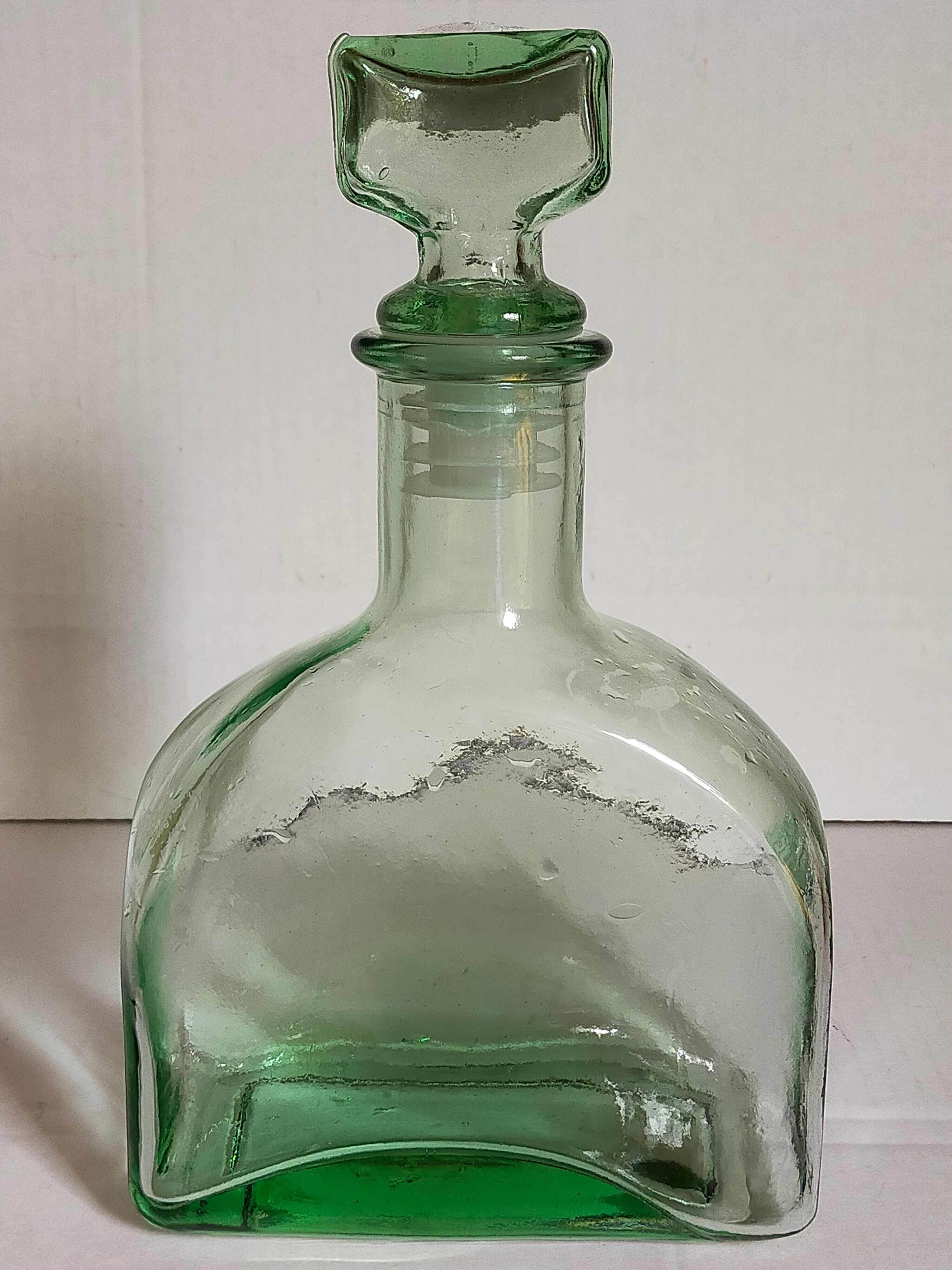 Vintage green glass whiskey decanter