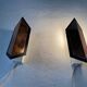 Pair of French wall lights with geometric design in copper, 1960, France.