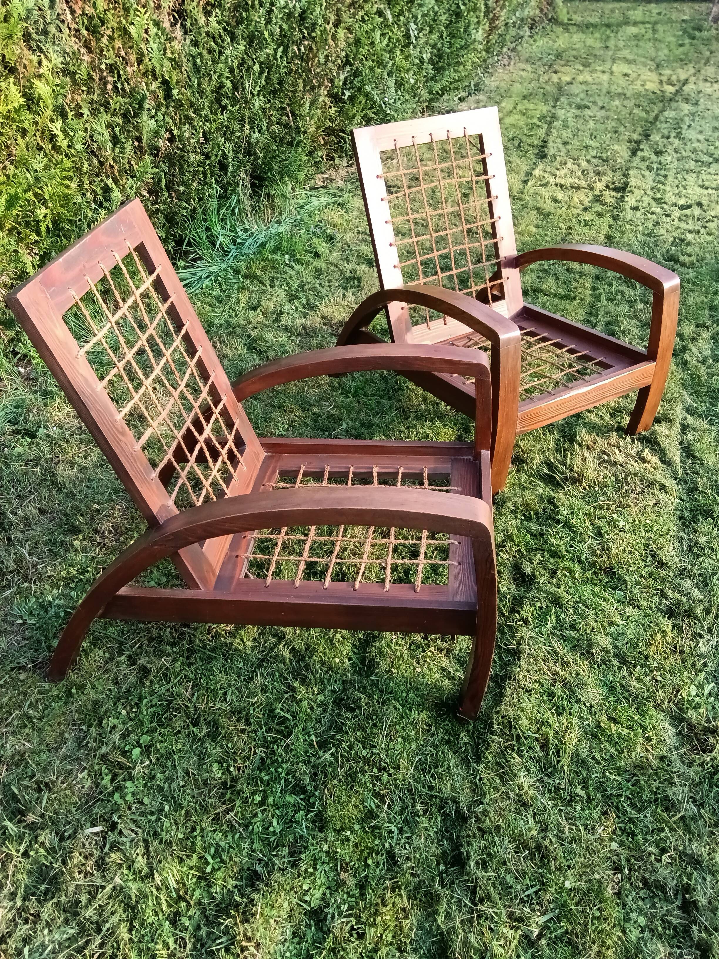 A pair of vintage rope and wood armchairs