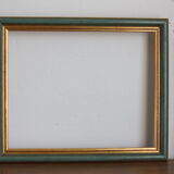 Frame in gilded and green wood