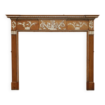 Victorian antique fireplace in tarred pine and sculpted gesso.