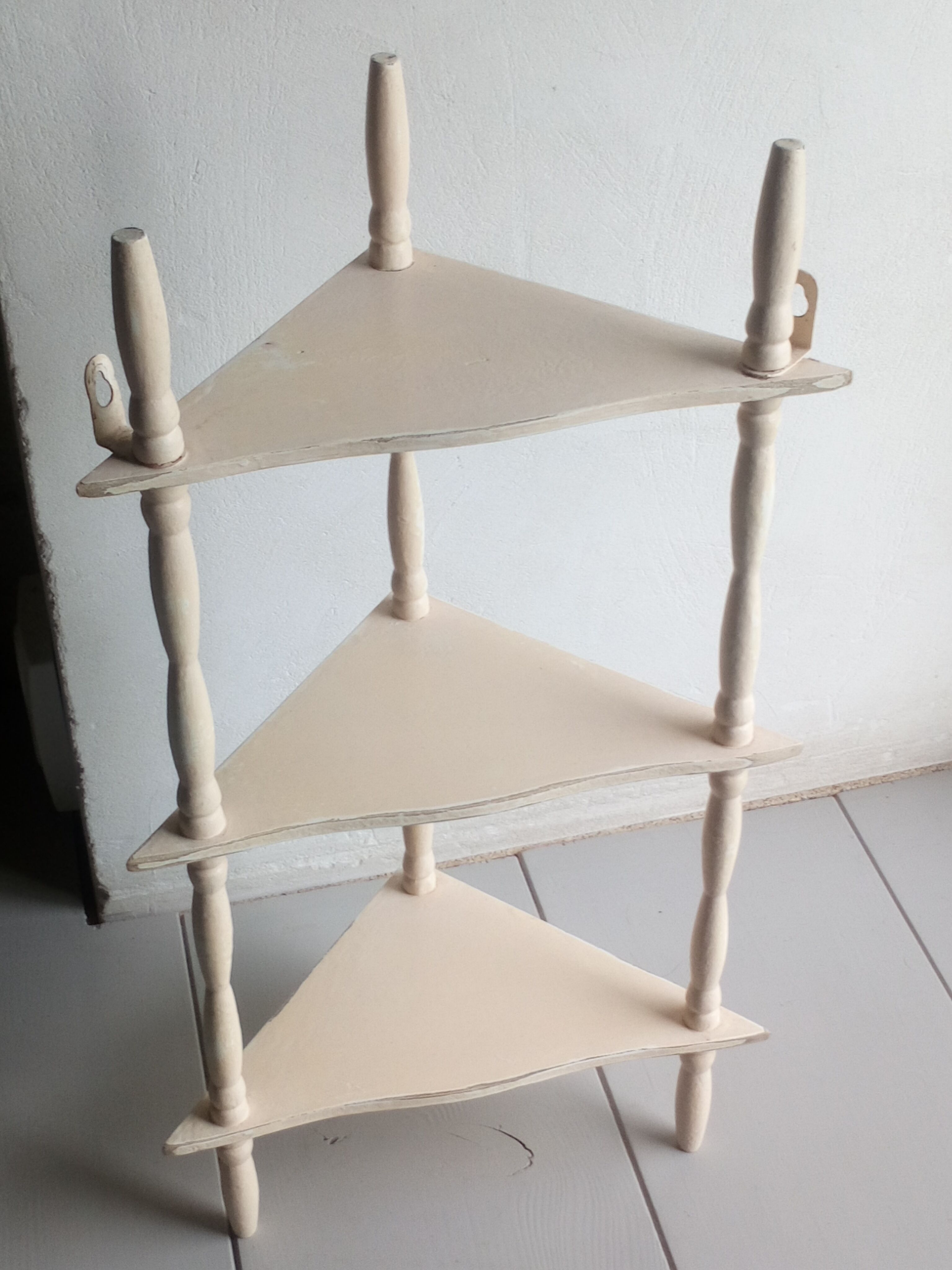 Old corner wall shelf turned wood