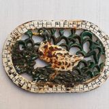 Cast iron dish underside with duck