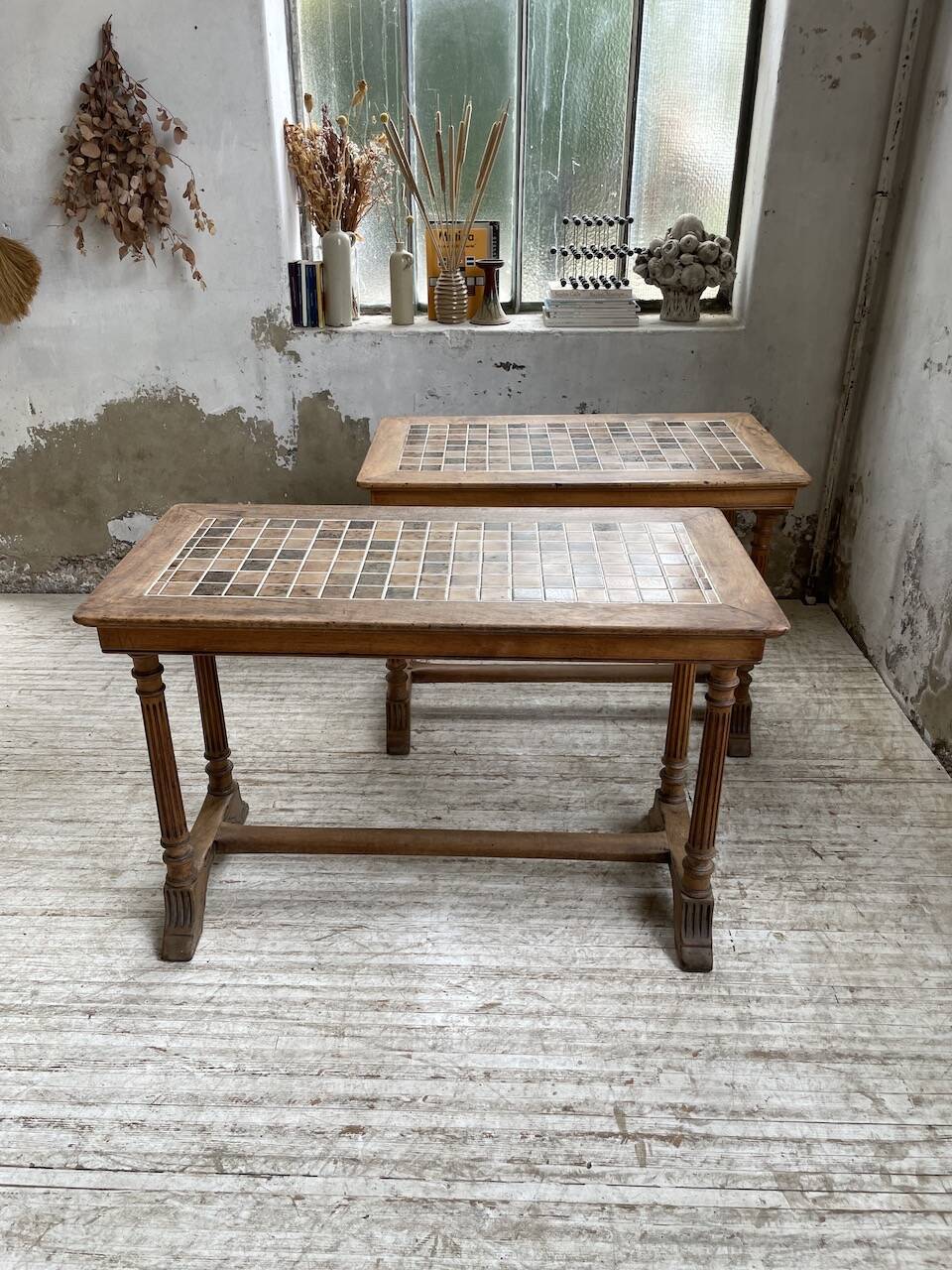 Set of two bistro tables in walnut and tiling from 1890.