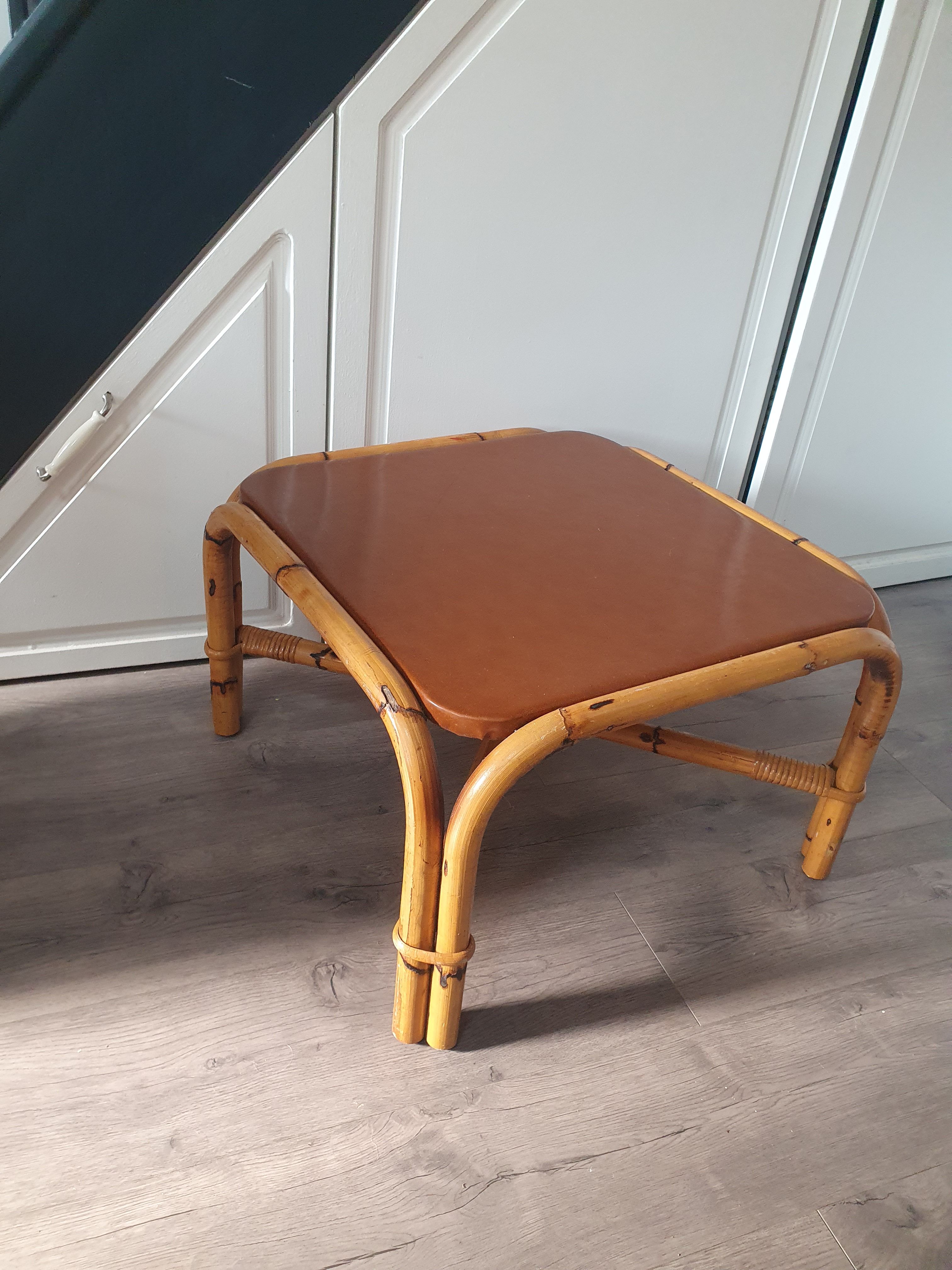 Rattan coffee table with brown leather top 63 cm side 39 cm high