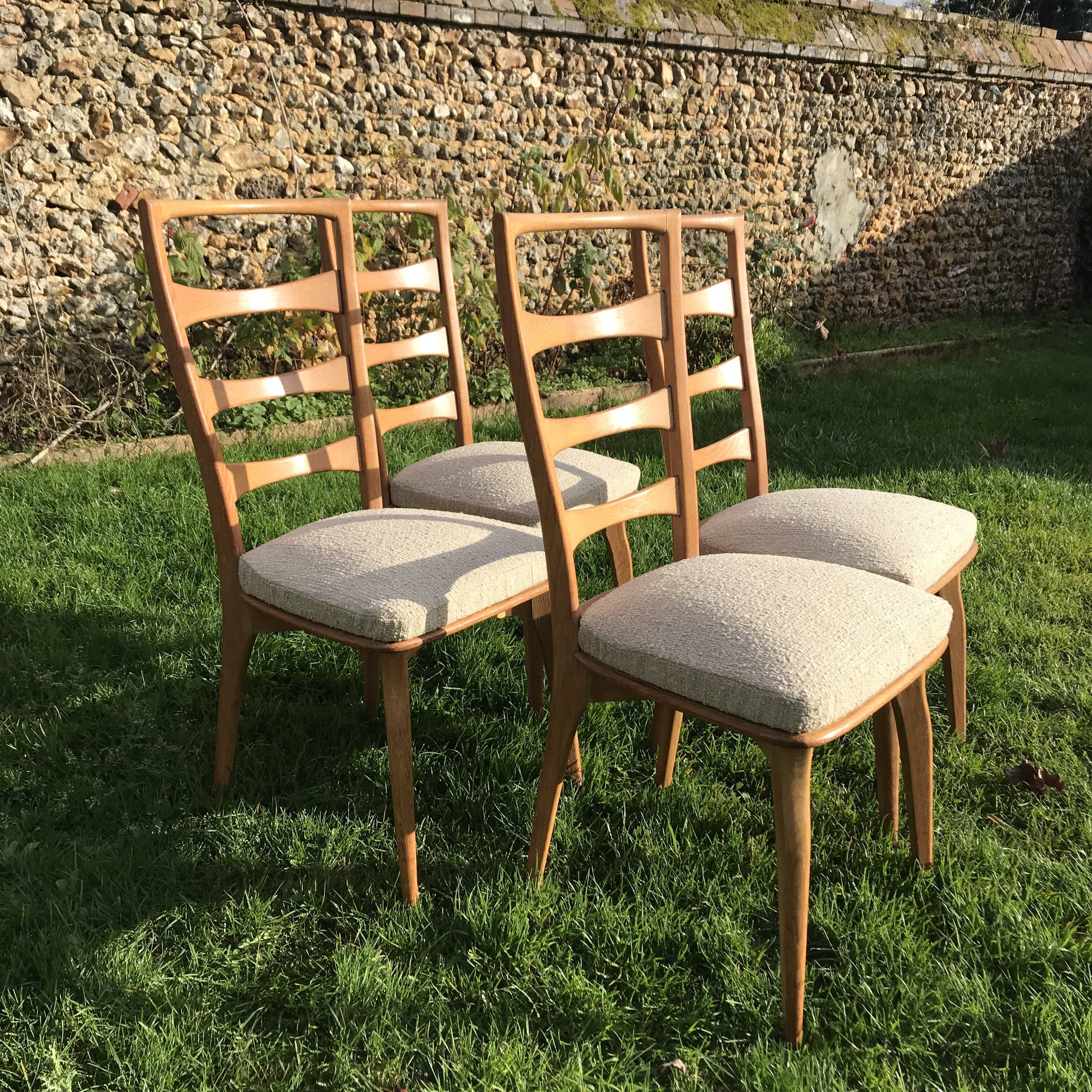 Lot de 4 chaises vintage en chêne blond et assise beige