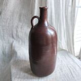 Large burgundy jar