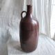 Large burgundy jar