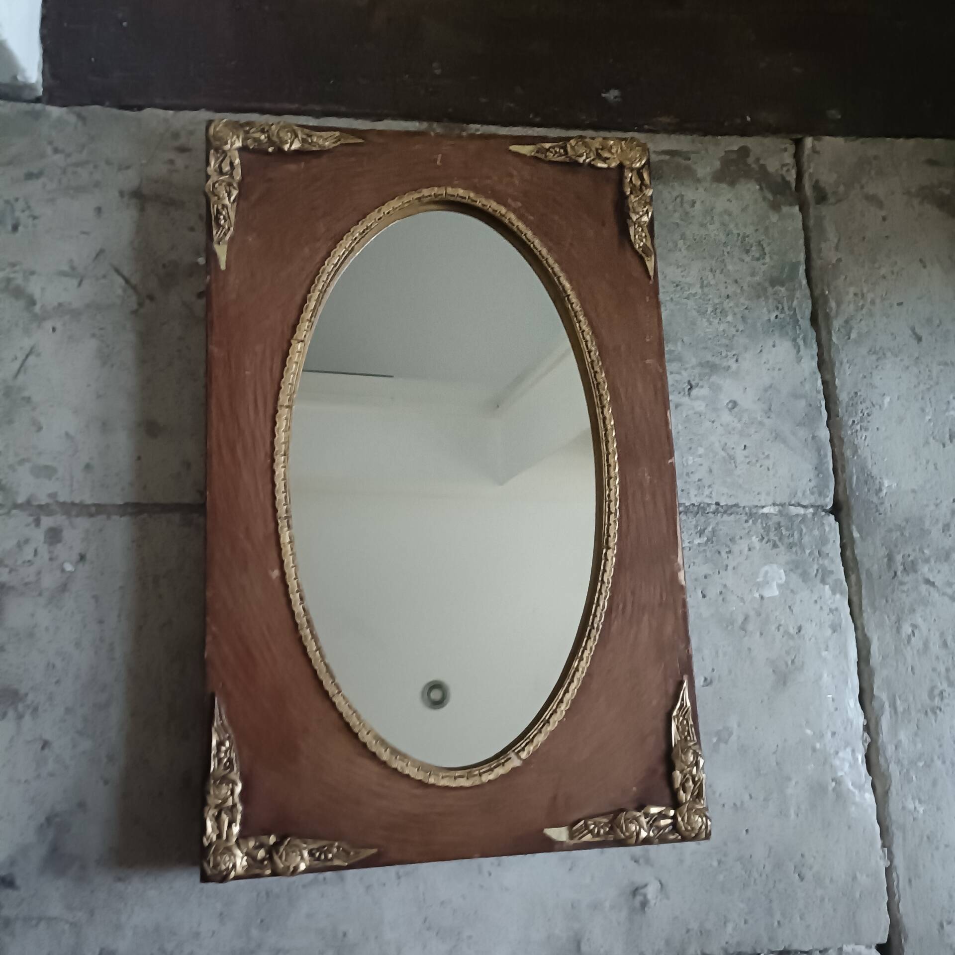 Oval and gold Art Deco mirror