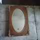 Oval and gold Art Deco mirror