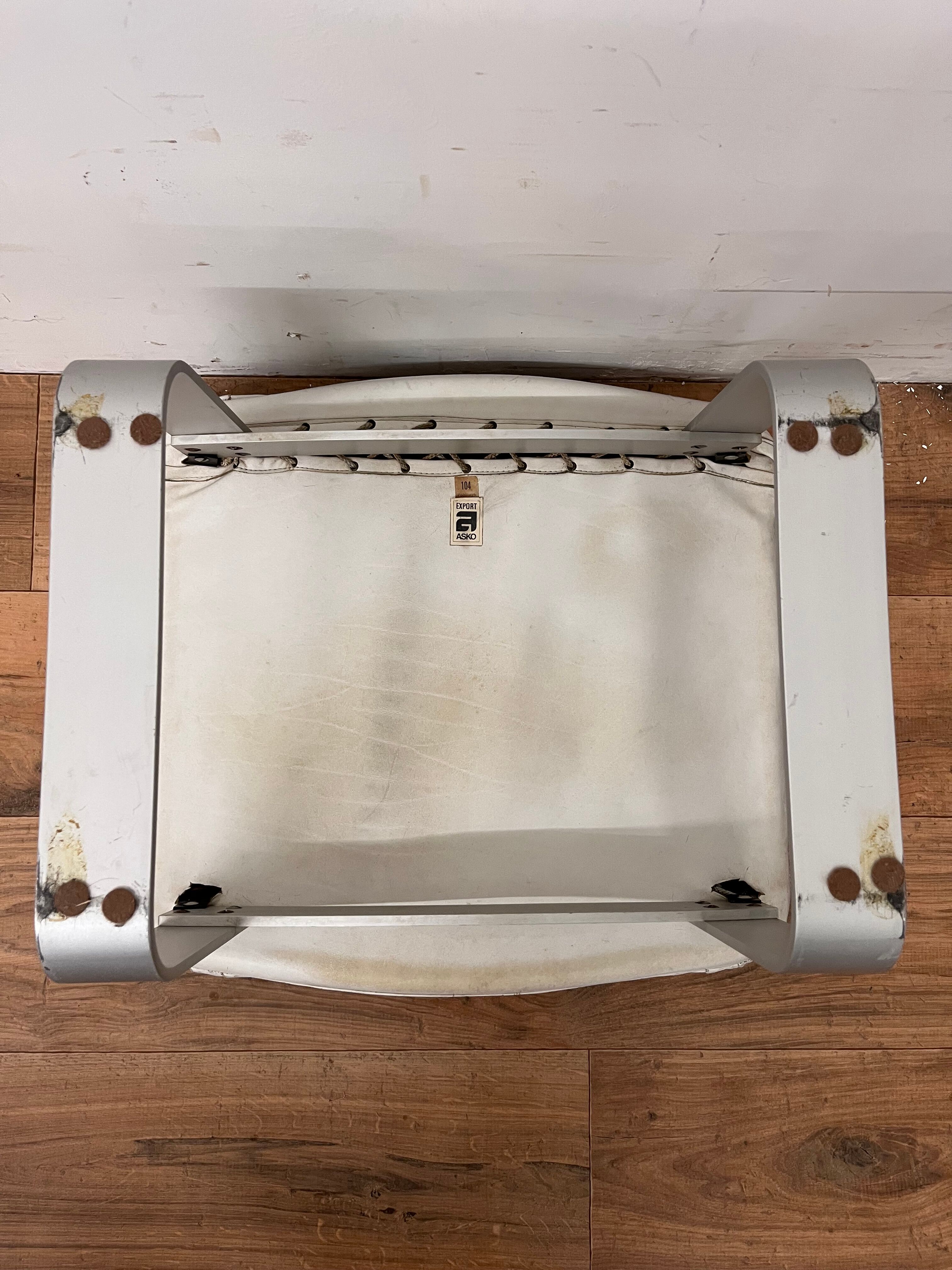 Pulkka armchair by Ilmaria Lappalainen and its ottoman