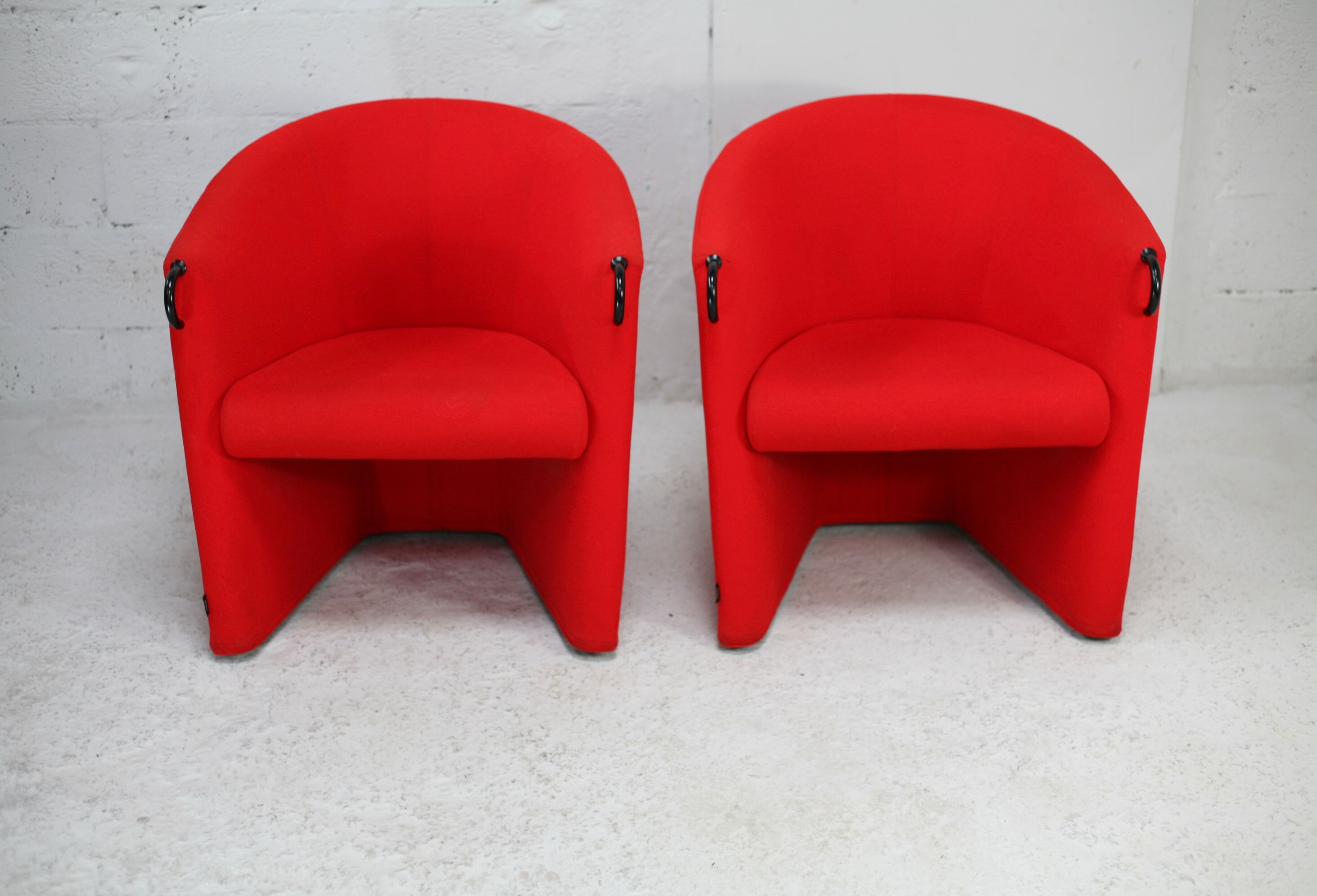 Pair of red Arflex armchairs. Italy, circa 1980
