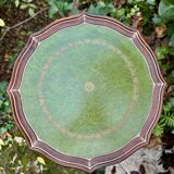 Green leather gueridon from the 1950s Regency period.