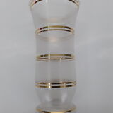 Vase decorated golden stripes