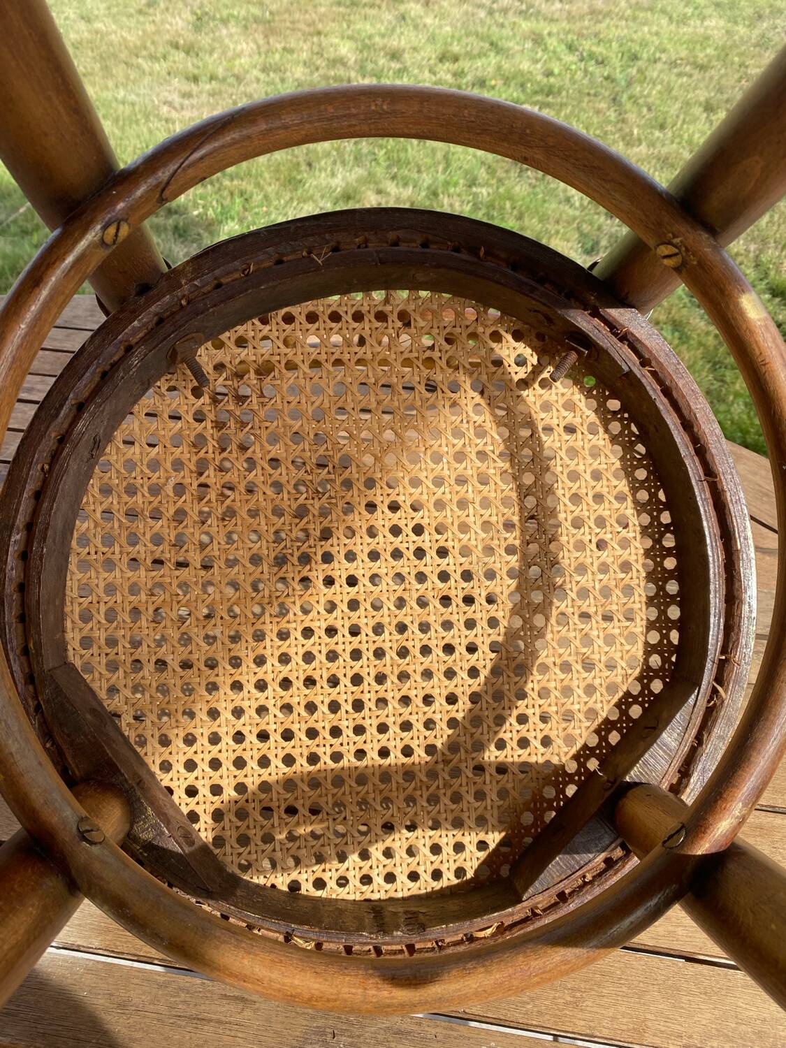 Children's chair in cane and curved wood