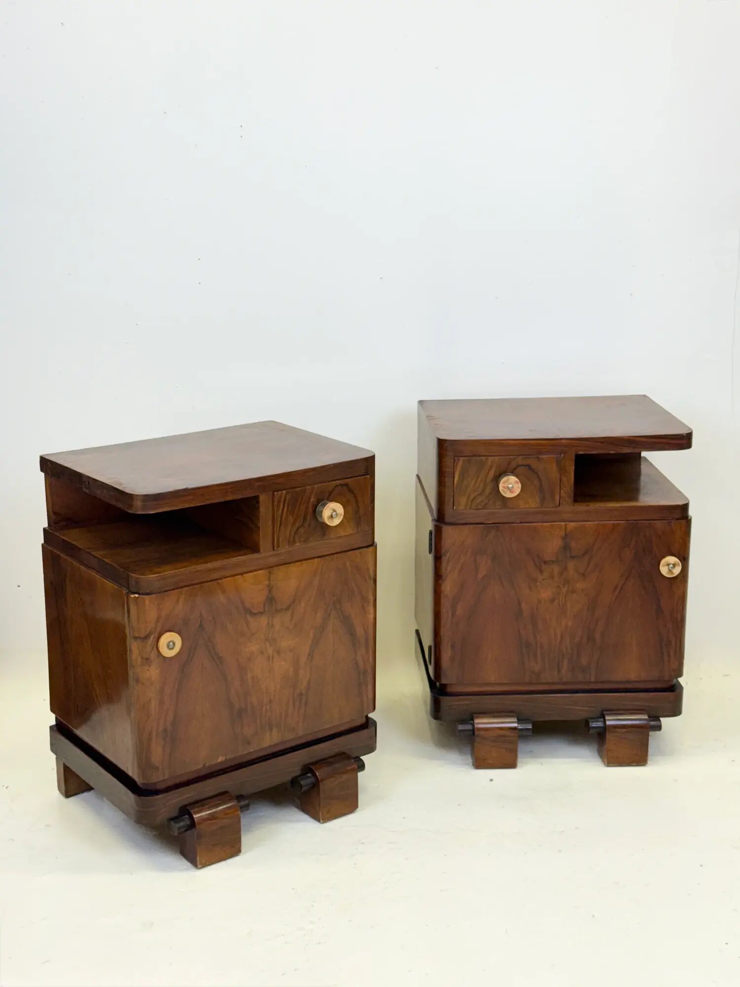 Pair of Art Deco bedside tables in walnut — Italy, 1930-1940