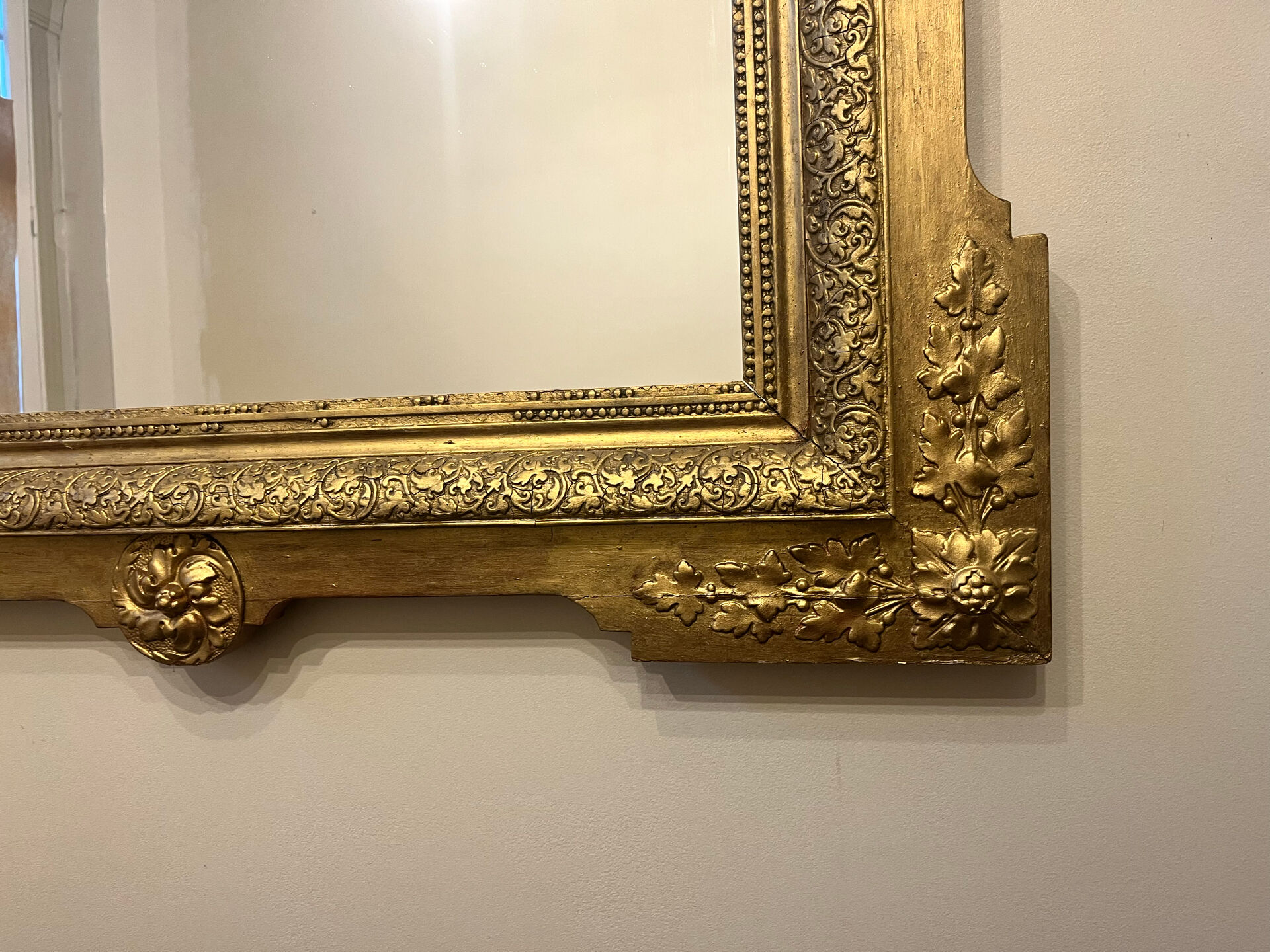 Antique gilded Louis XVI mirror