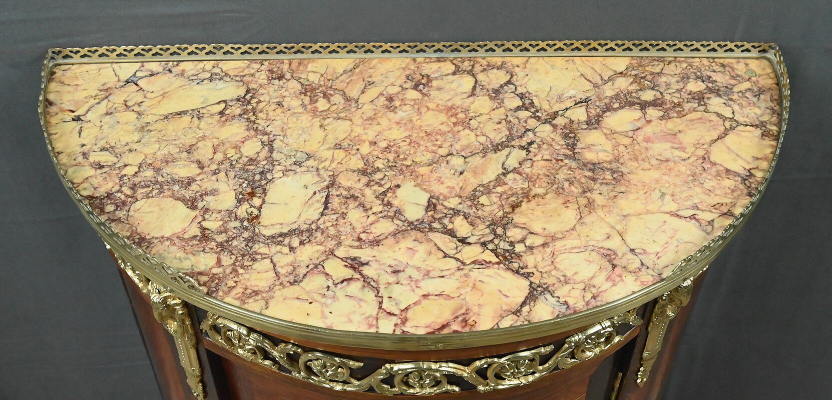 Small living room piece in precious wood marquetry, Louis XVI style – mid-19th century.