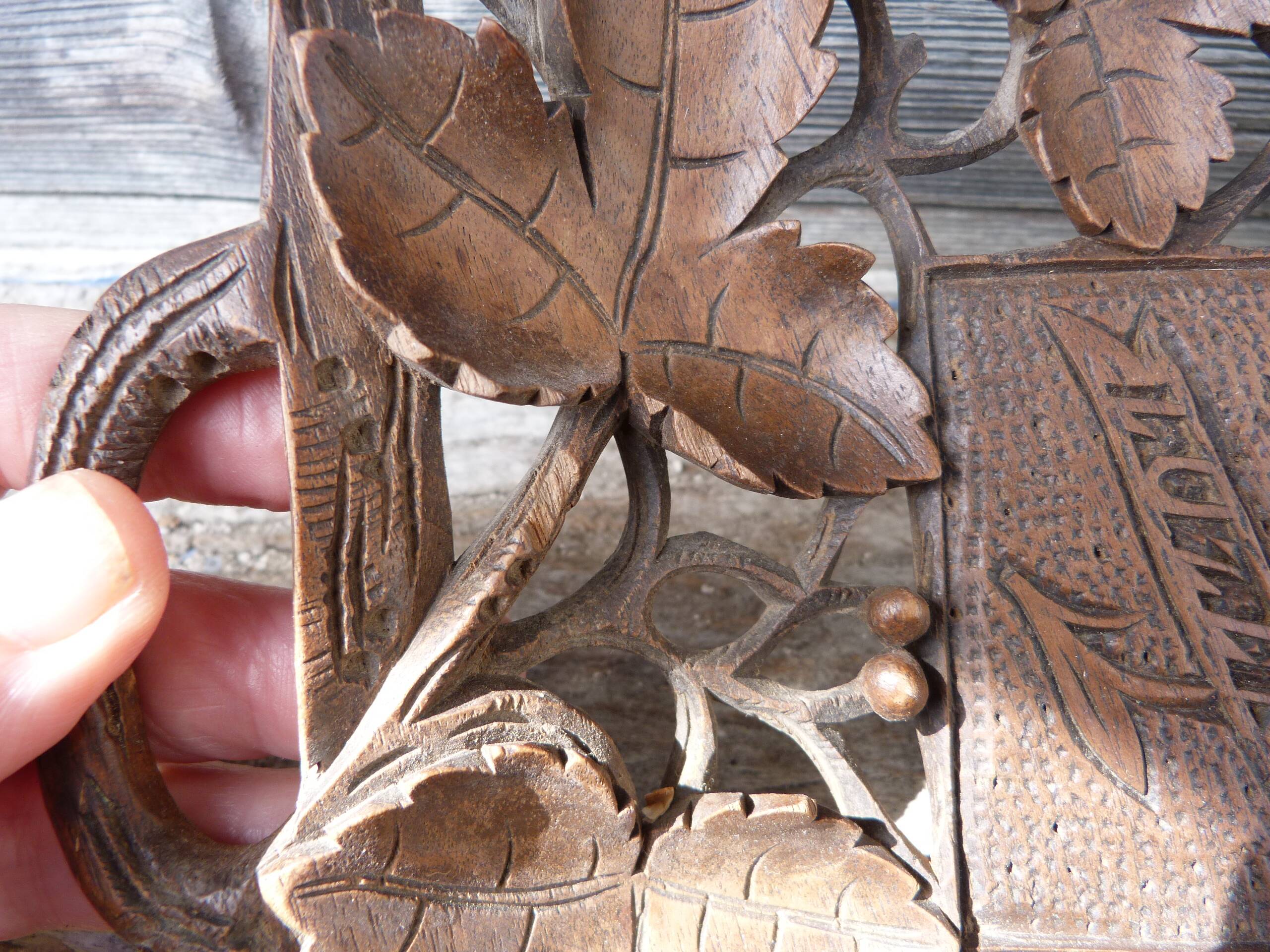 Small wooden tray cut out with leaf patterns