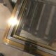 Table verre inox et laiton