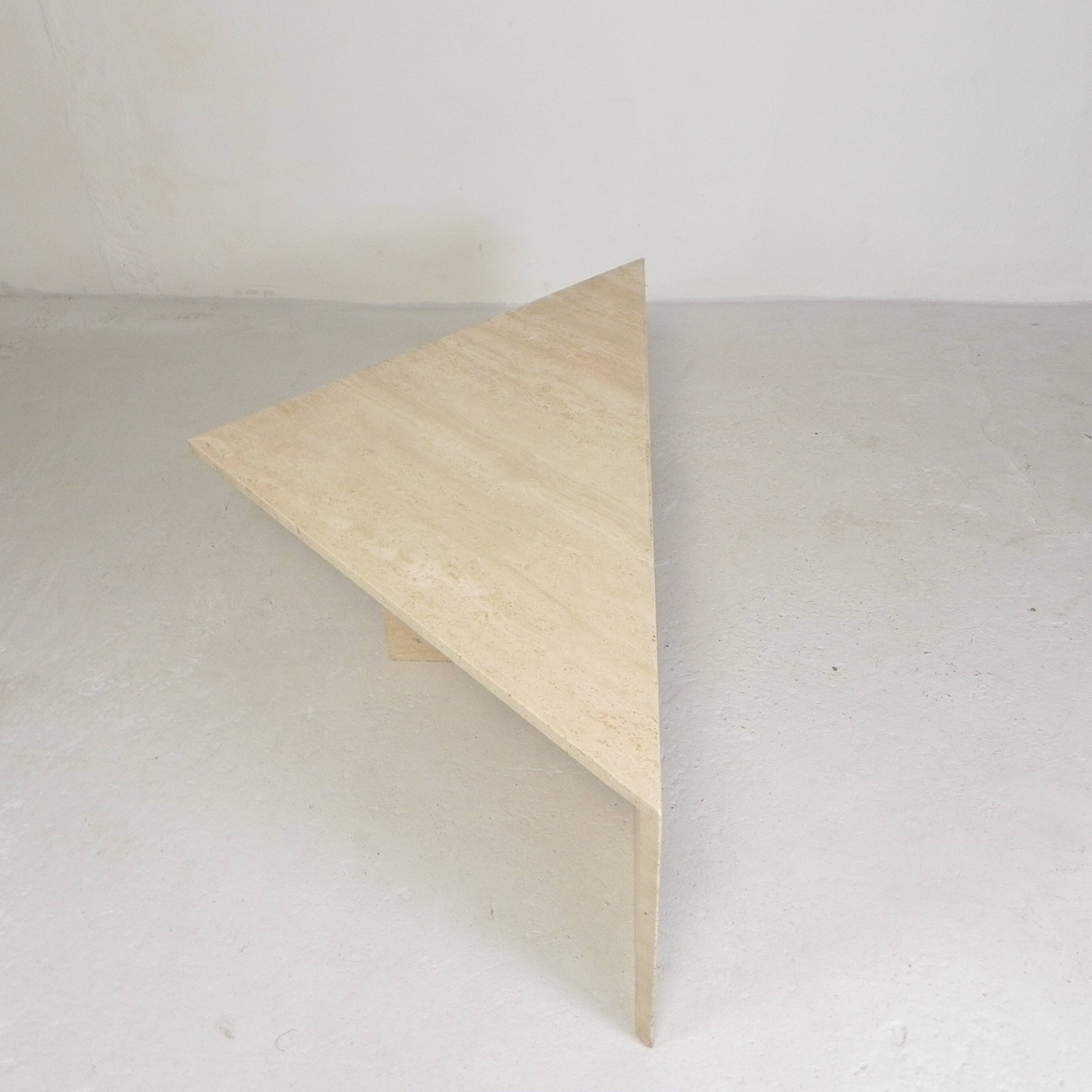 Mid-Century travertine coffee table with a triangular top, 1970s.