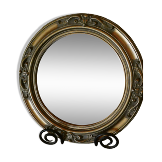 Round golden mirror