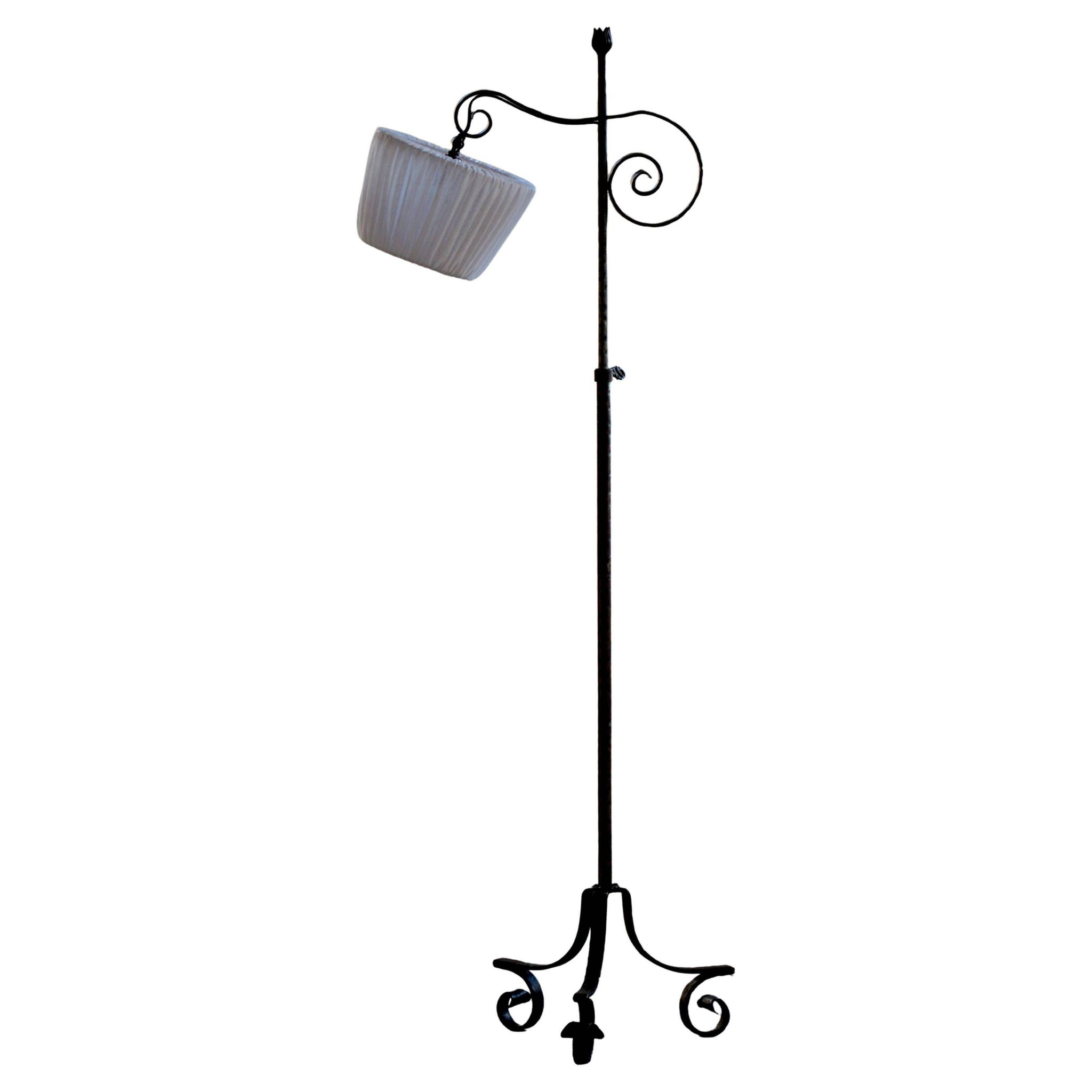 20th-century wrought iron floor lamp with swirling detail, Danish Art Deco.