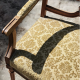 Old yellow velvet bench