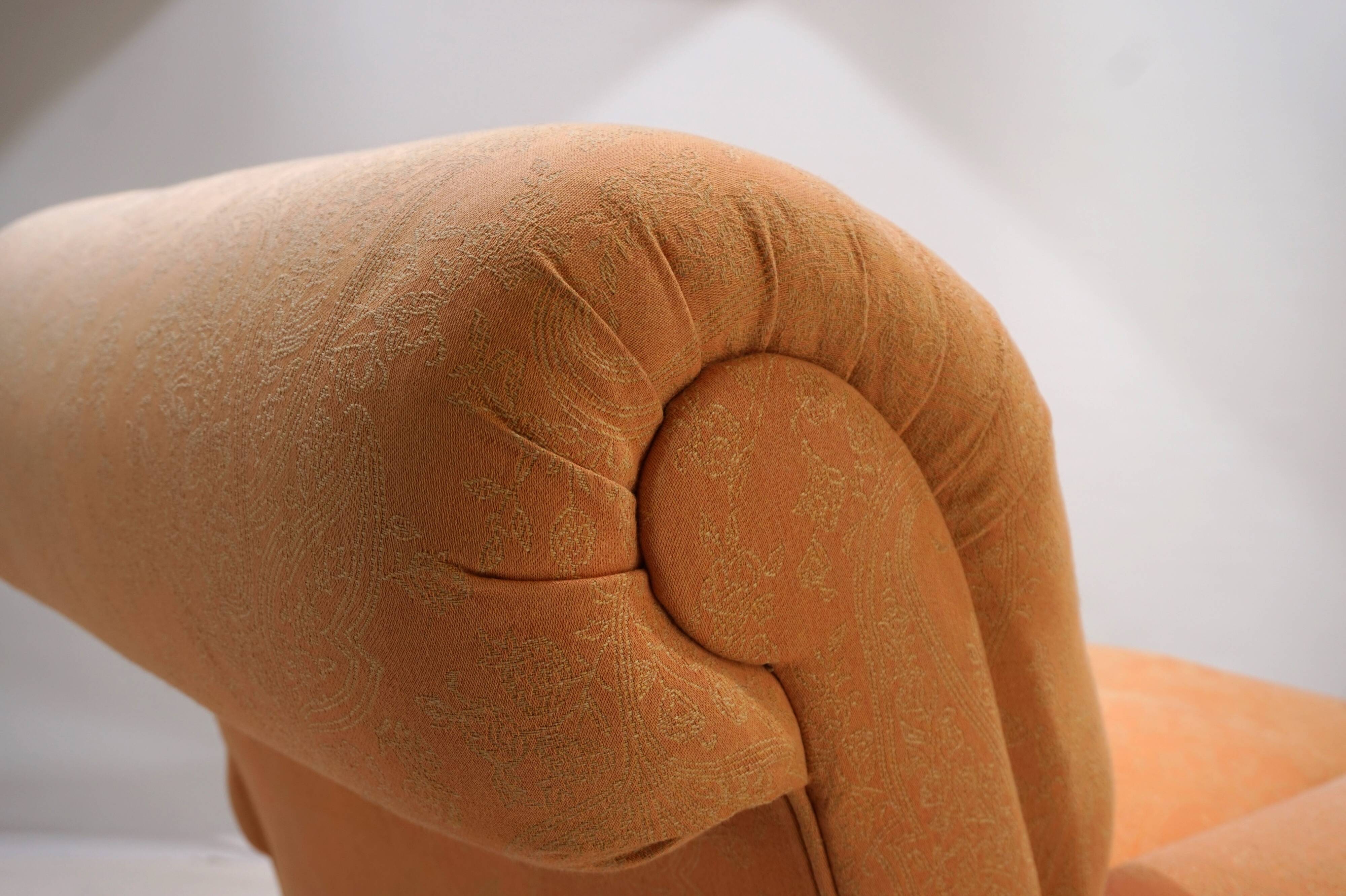 Deep seated armchair in the style of Howard & Sons