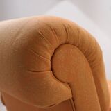 Deep seated armchair in the style of Howard & Sons